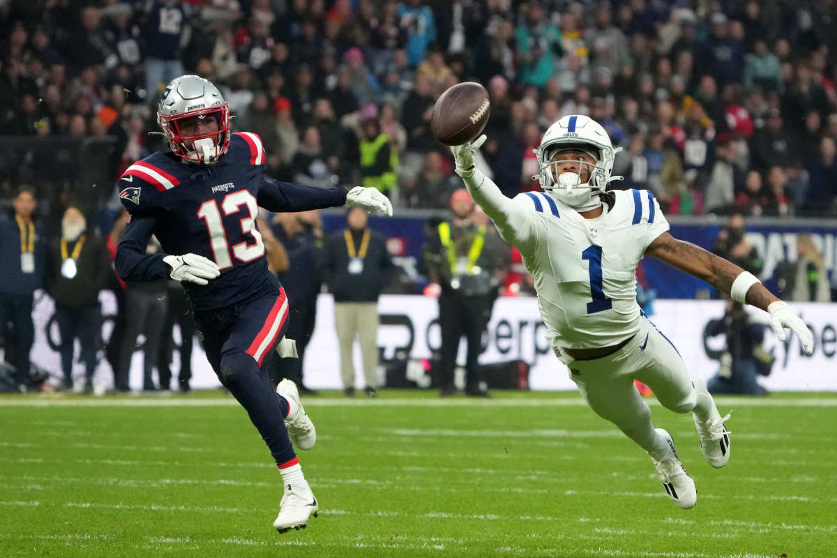 Nov 12, 2023; Frankfurt, Germany; Indianapolis Colts wide receiver Josh Downs (1) attempts to catch the ball against New England Patriots cornerback Jack Jones (13) in the first half during an NFL International Series game at Deutsche Bank Park. 
